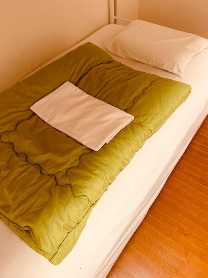 Guesthouse Shiawase Eki Fukuoka  Extérieur photo