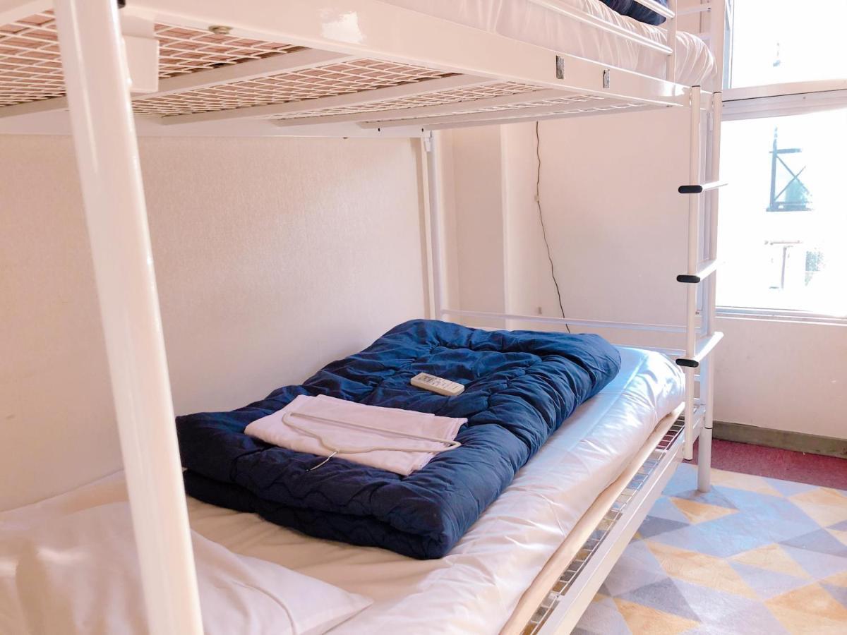 Guesthouse Shiawase Eki Fukuoka  Extérieur photo