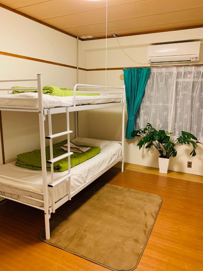 Guesthouse Shiawase Eki Fukuoka  Extérieur photo